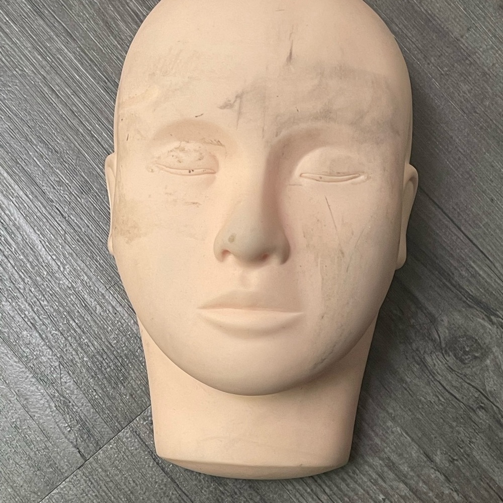 Realistic Cream Head Sculpture